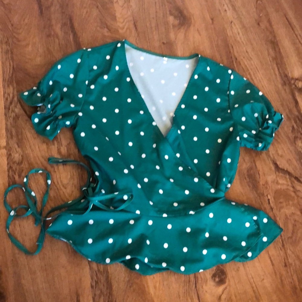 Green polka dot wrap blouse